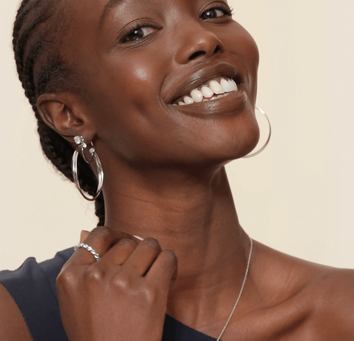 woman with jewelry on Early Jewelry Gift Guide